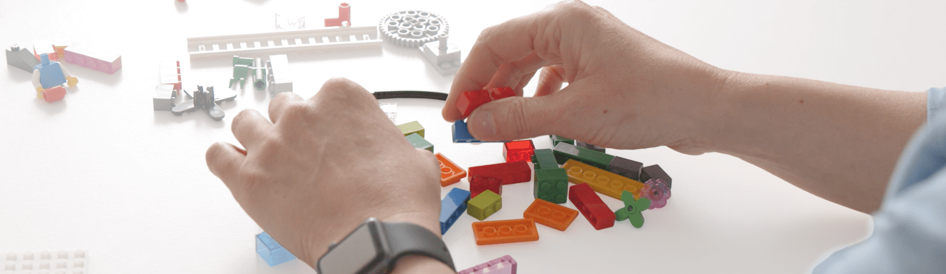 A person participating in an online LEGO Serious Play certification course.