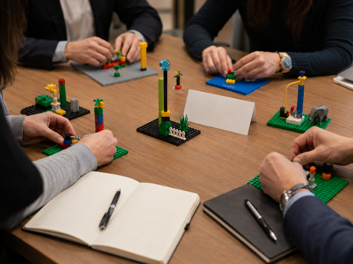 Facilitator guiding LEGO SERIOUS PLAY Method participation in a corporate session